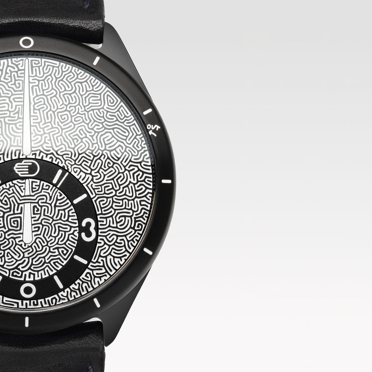 A close view of the labyrinth pattern across the moving dial display.