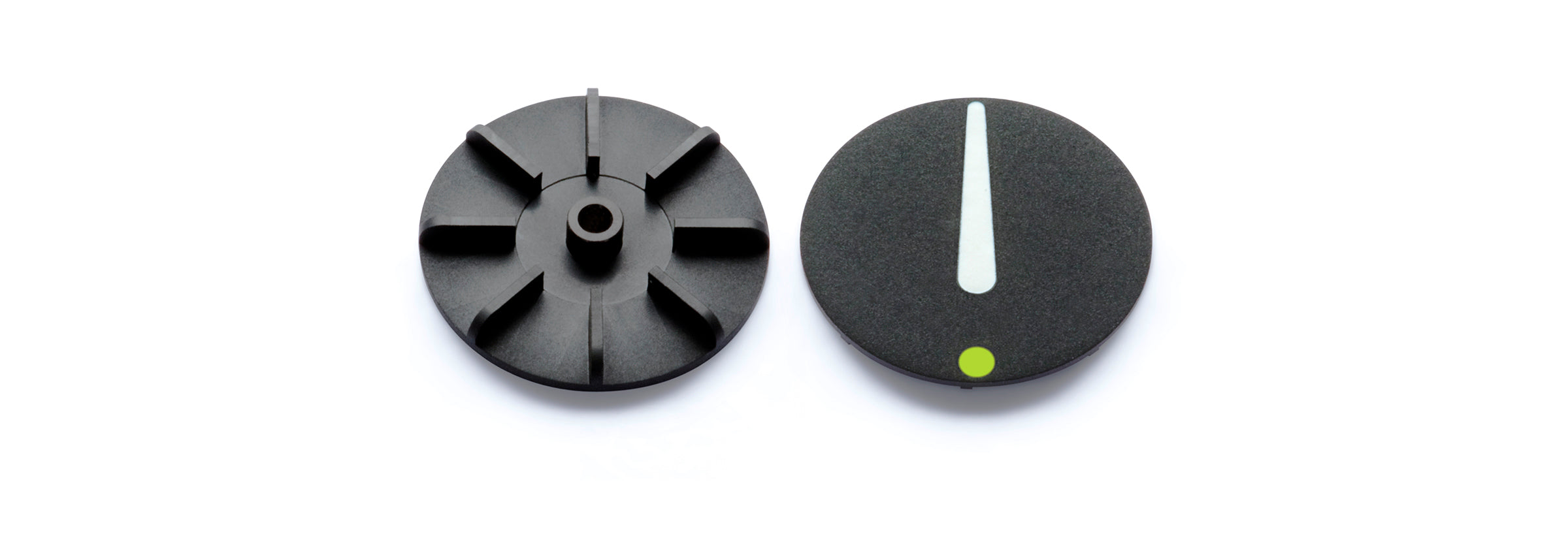 Ressence's hydraulic shock absorber component for oil-filled watches shown on the left from the inside, and on the right as seen on the dial, on a white background.