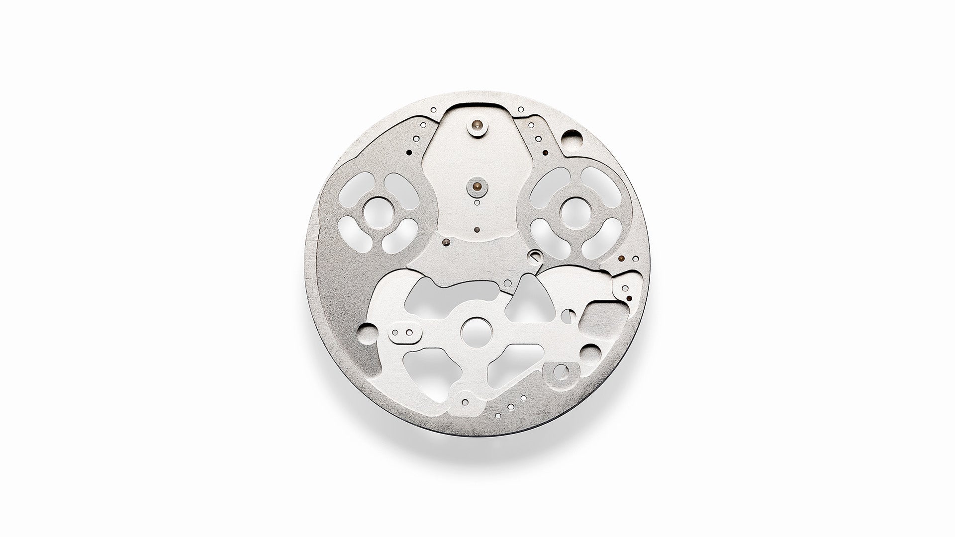 Ressence ROCS (Ressence Orbital Convex System) internal disc module on a white background