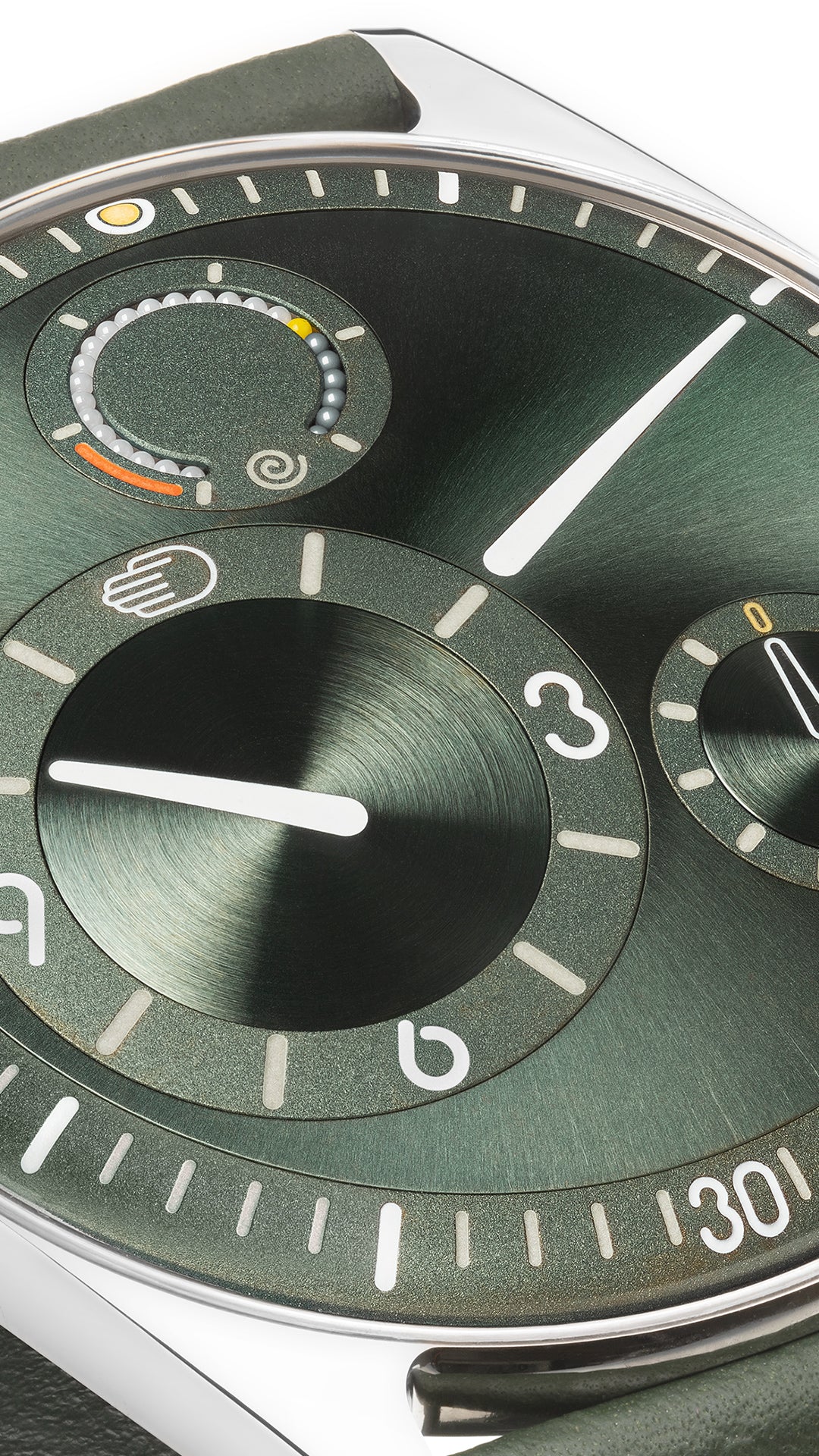 Vertical close-up of the Ressence TYPE 11 Pine green watch face with detailed design and showcasing the power-reserve indication