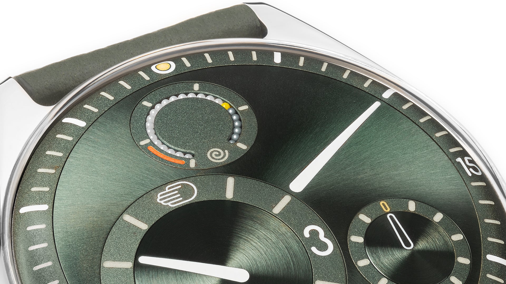 Close-up of the Ressence TYPE 11 Pine green watch face with detailed design and showcasing the power-reserve indication