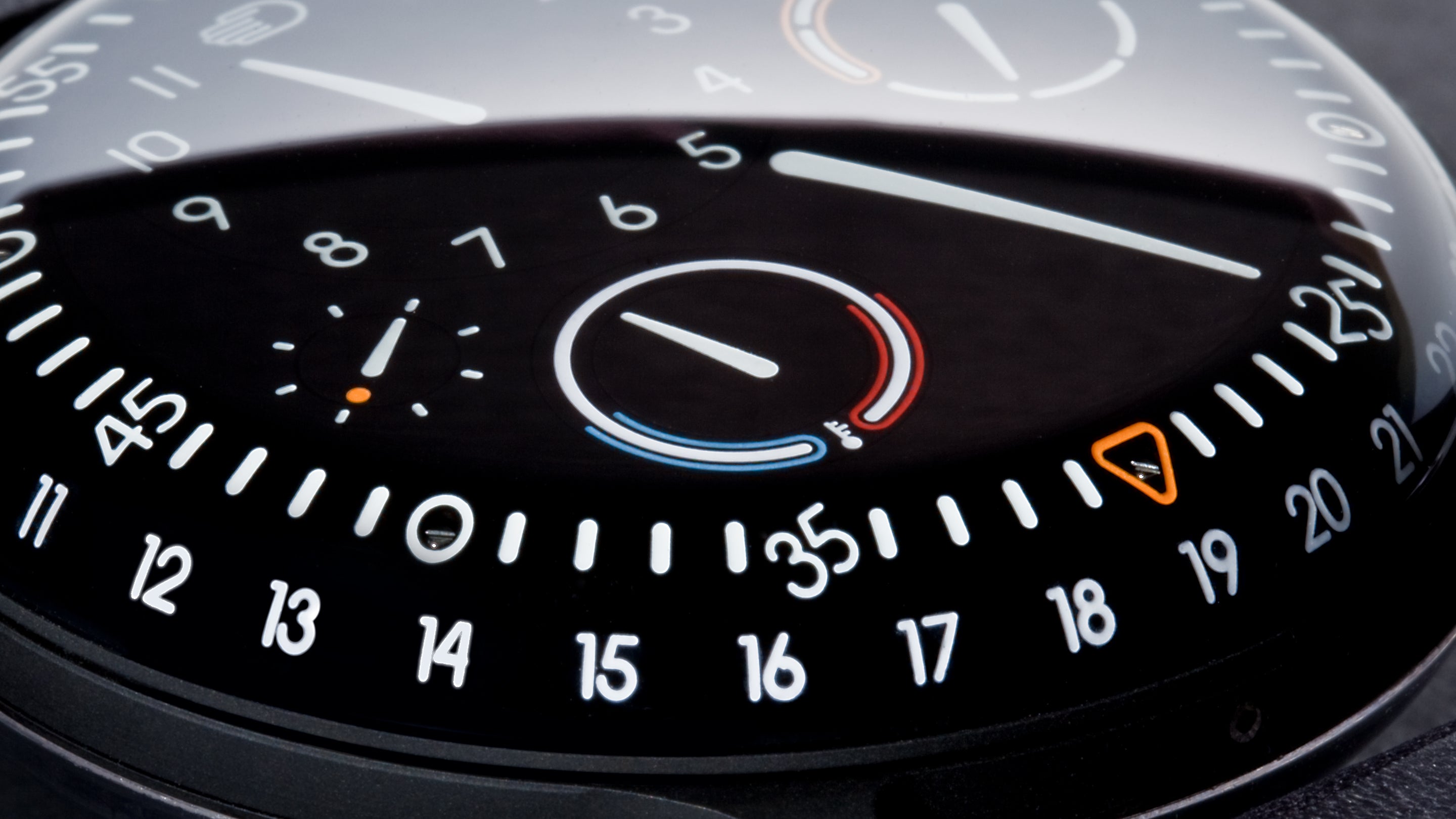 Close of of a Ressence TYPE 3 Black dial, focused on the temperature indication disk.