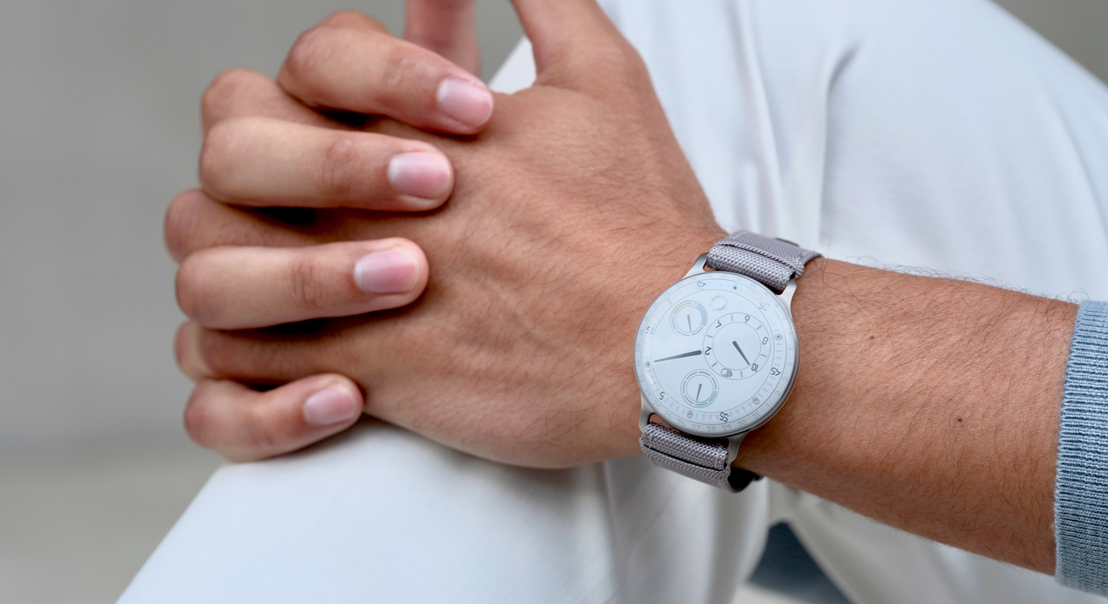Ressence TYPE 3 White, the ultimate oil-filled high end mechanical watch, shown on a man's wrist.