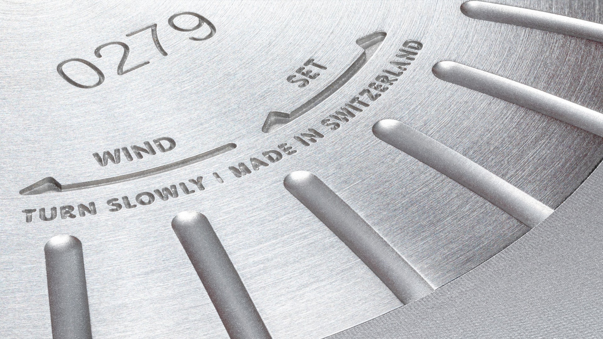 Detailed shot of the Ressence TYPE 8 caseback, displaying the serial number, setting and winding instructions, and the Made in Switzerland engraving