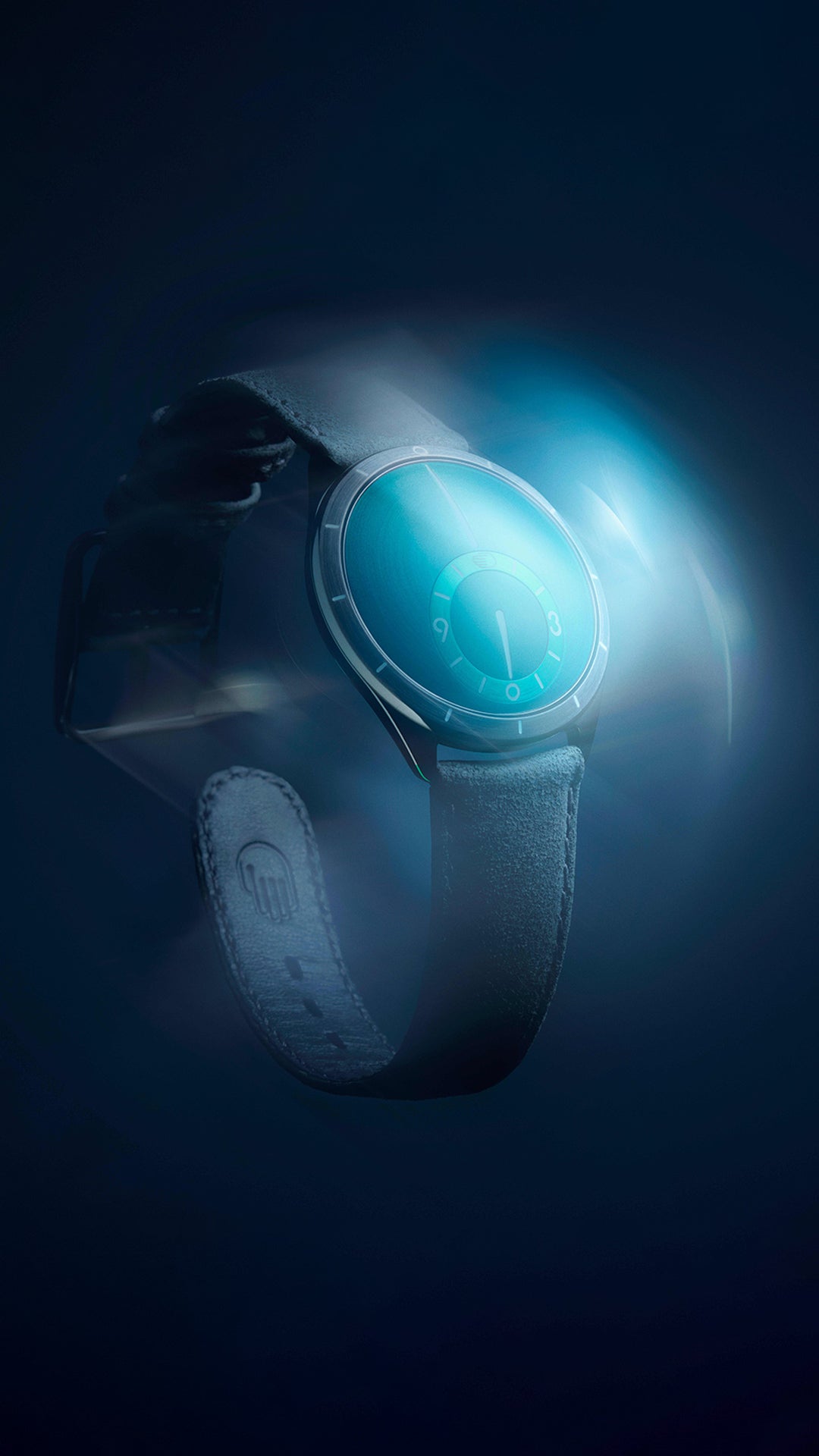 Ressence TYPE 9 Aqua, a modern 39mm watch, shown in an artistic blue blur representing speed and movement, on a grey leather strap and dark background. vertical image